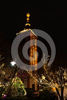 The Siegen monument the Nikolai Church by night in the upper town, Germany photo