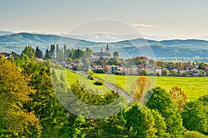 Sielnica village with the church and Low Tatras mountains on horizont