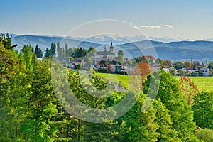 Sielnica village with the church and Low Tatras mountains on horizont