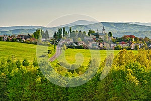 Sielnica village with the church and Polana mountains on horizont