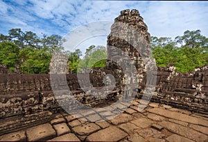 SIEM REAP, CAMBODIA. The ruins of Bayon Temple with many stone faces, Angkor Historical Park