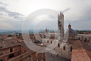 Siena Cathedral Duomo di Siena at sunset - Siena, Tuscany, Italy