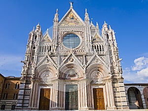 Siena Cathedral main facade, a medieval church now dedicated to catholic Assumption of Mary, Tuscany, Italy