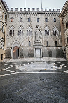 Siena, Italy - 22 Nov, 2022: Piazza Salimbeni, Banca Monte dei Paschi di Siena, and the state of Sallustio Bandini