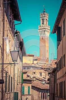 Siena, Italy. Mangia Tower, Italian Torre del Mangia. Tuscany region. Vintage