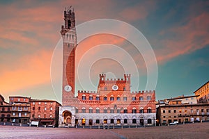 Siena, Italy - Piazza del Campo and the Mangia Tower, morning sunrise