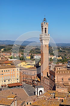 Siena, Italy. Torre del Mangia - famous bell tower located on the city`s premier square