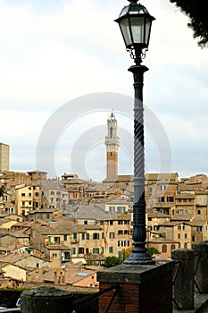 Siena, panorama of the ancient Tuscan city. View of the town with its main monuments: the Cathedral, the Torre del Mangia