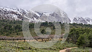 Aitana mountain with snow in Benifato, Alicante, Spain photo