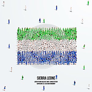 Sierra Leone Flag. A large group of people form to create the shape of the Sierra Leone flag.