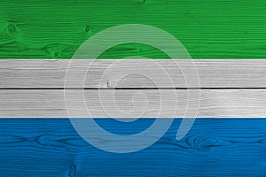 Sierra leone flag painted on old wood plank