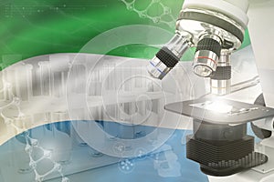 Sierra Leone science development digital background - microscope on flag. Research of pharmaceutical industry design concept, 3D