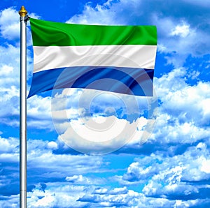 Sierra Leone waving flag against blue sky