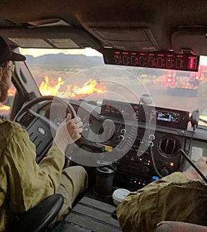 Sierra Vista, Arizona - July 14,2019 Wildland Fire near U.S. Army Fort Huachuca In-cab Fire engine on Scene looking out