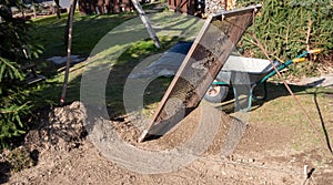 Sieve garden soil into a compost heap