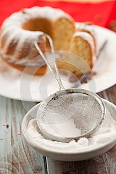 Sieve with powdered sugar photo