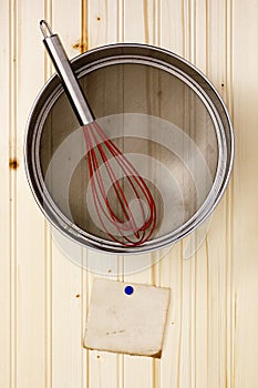 Sieve on a wooden wall