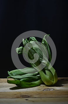 Siew pak choy vegetable at the kitchen table background