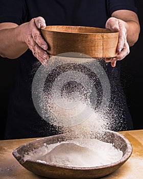 Sift the flour for the homemade dough photo