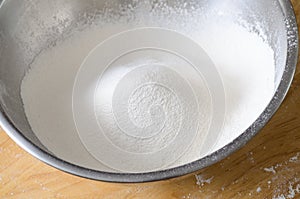 Sifted flour in a bowl