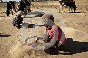 Sifting grain, Ethiopia