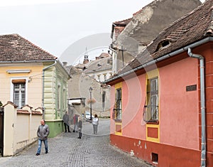 Monastery street in the castle of old city. Sighisoara city in Romania