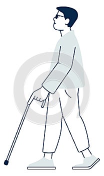 Sightless young man with walking cane. Blind person