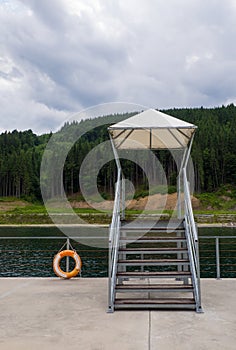 Empty Lake of Youth beach in Bukovel in summer