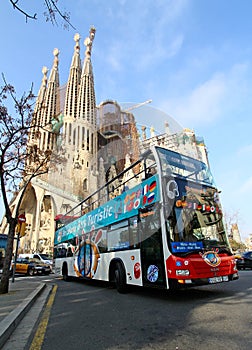 Sightseeing bus in front of Sagrada Familia