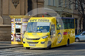 Sightseeing bus on Parizska street near Old Town Square in Prague, Czech Republic