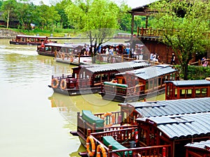 Sightseeing sculling boats lines up