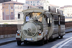 Sightseeing touristic train in Pisa, Italy