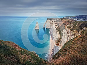 Sightseeing view to the famous rock Aiguille of Etretat in Normandy, France