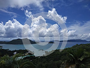 Sightseen of tropical islands and giant clouds at Praslin Seychelles photo