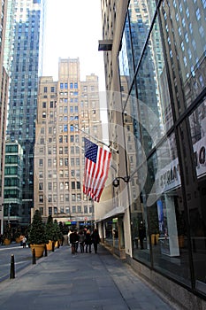 Sightseers walking past the windows,where 'Good Morning America' is taped,Times Square area,New York,2015