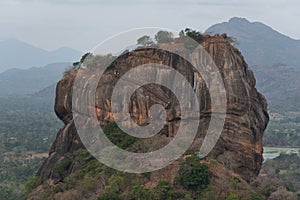 Sigiriya or Sinhagiri is an ancient rock fortress located in the northern Matale District near the town of Dambulla in the Central