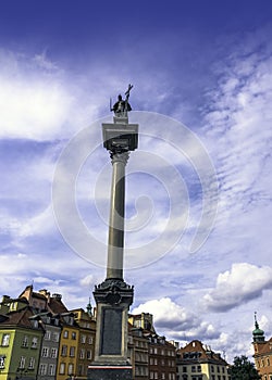 Sigismund`s Column in Castle Square with vintage architecture of Old Town in Warsaw, Poland