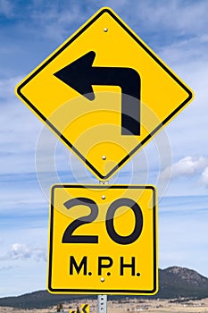 Sign for 20 MPH Curve photo