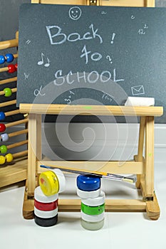 Sign ,,Back to school` on the black board