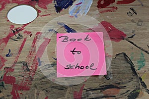Sign ,,Back to school` on paint pallet