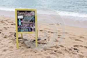 Sign on a beautiful beach for booze and beer