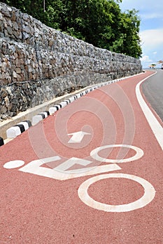 Sign of bicycle lane with arrow direction.
