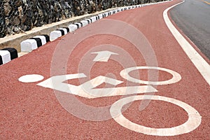 Sign of bicycle lane with arrow direction.