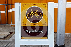 A sign of bicycle parking in a tourist area of Bangkok