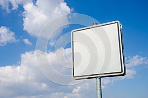 Sign on blue sky background