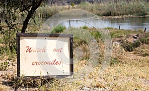 Sign boar indicated to the guests the presence of crocodiles