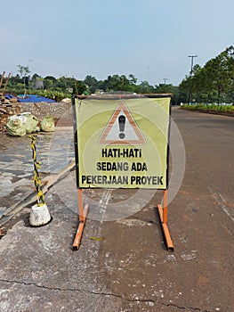 sign board that reads be careful because there is project work photo
