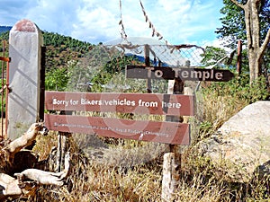 Sign board showing way to Chimi Lhakhang, Bhutan