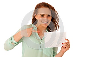 Sign board. Woman holding big white blank card. Positive emotion