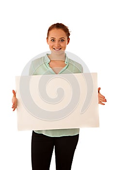 Sign board. Woman holding big white blank card. Positive emotion